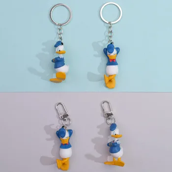 Mielas Atsipalaiduoti Donald Duck Key Chain Pakabukas Kawaii Ausinės Atveju Keychain Cartoon Automobilių Paketų Prižiūrėtojų Raktinę Dovanos